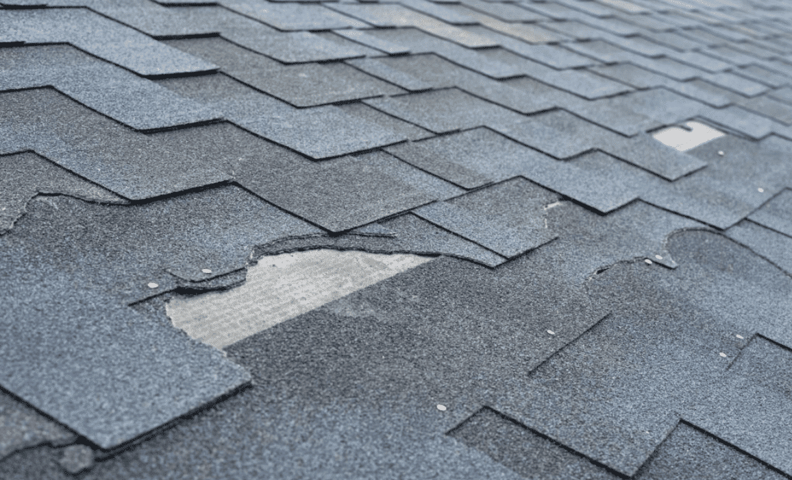 Shingle roof replacement for damaged shingles