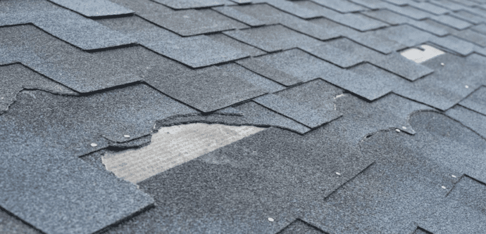 Shingle roof replacement for damaged shingles