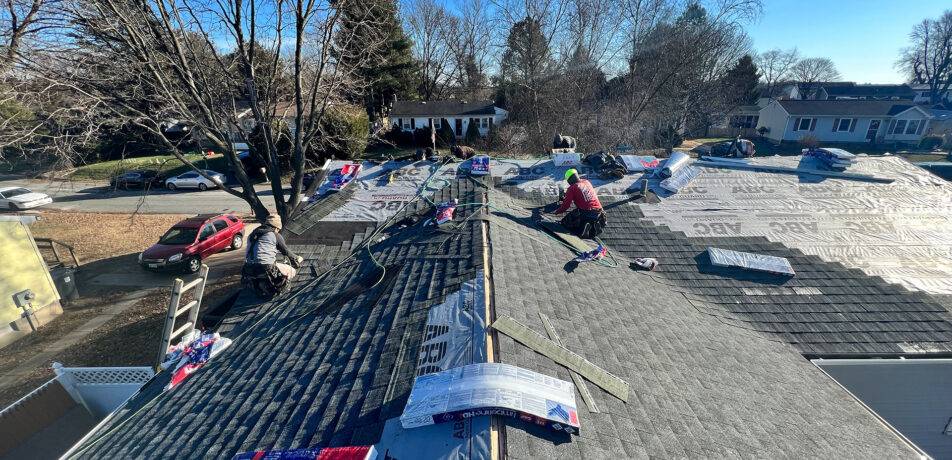 Harford Roofing services team installing GAF shingles
