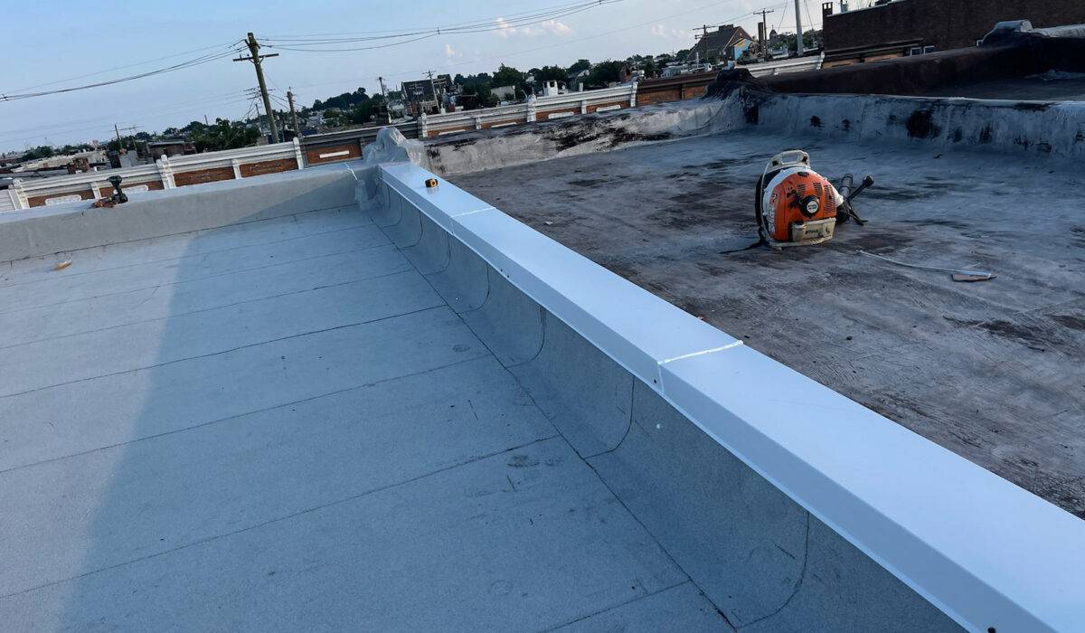 flat roofing damage signs